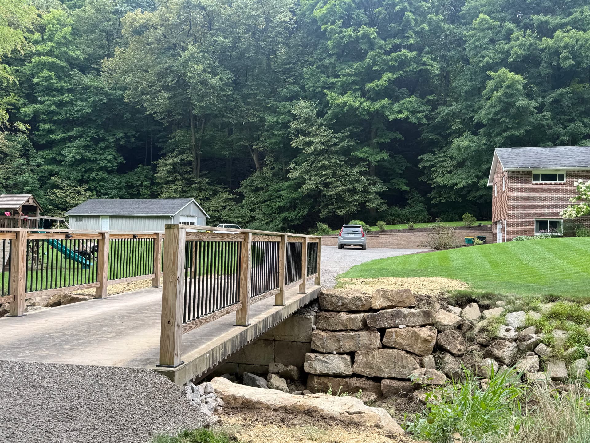 Gallery photos for Hillside Washout Fixed With Massive Boulder Erosion Control: Image #2