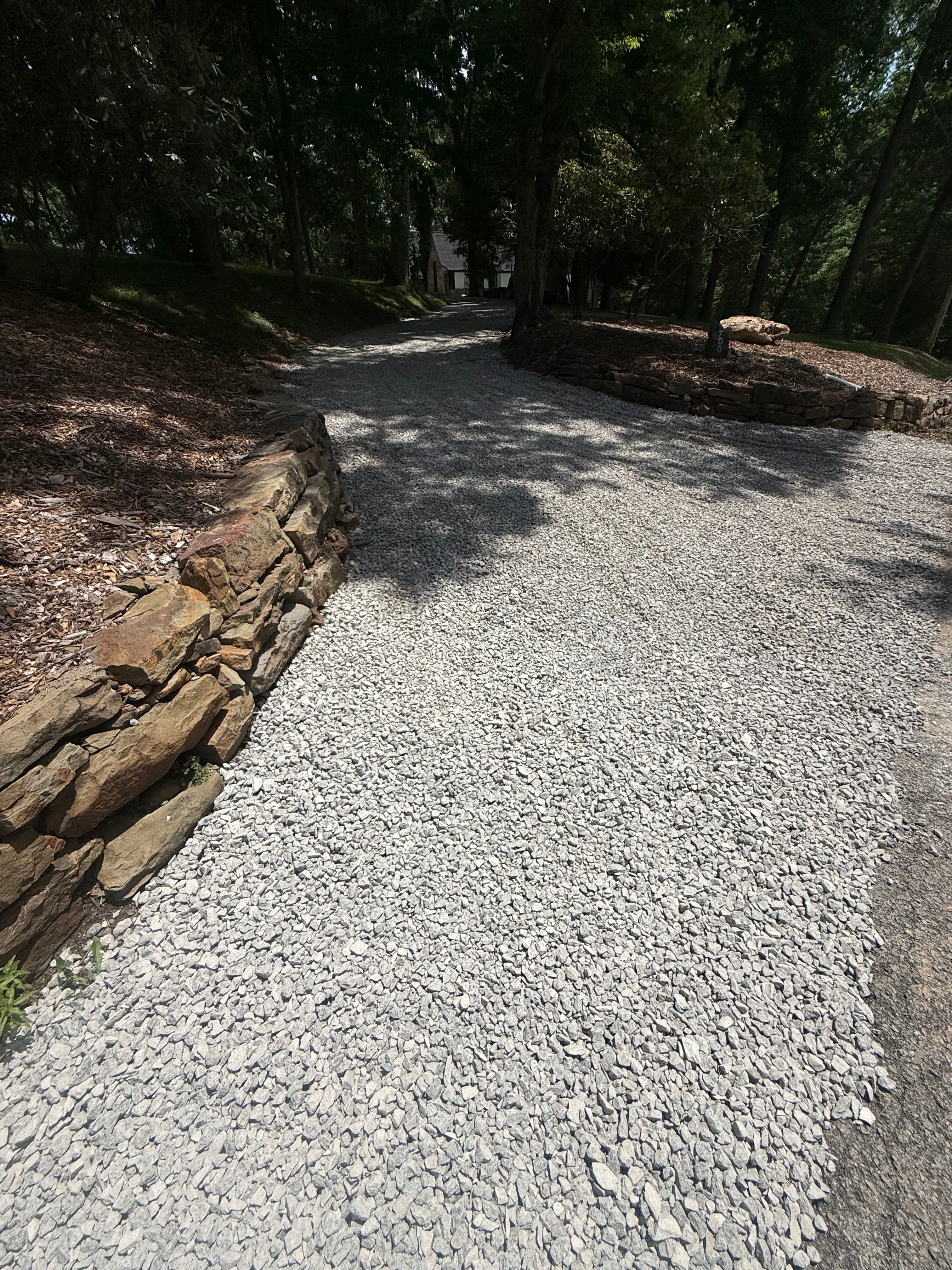 Project Driveway Drainage Fix with New Catch Basins and Stone Wall Rebuild image