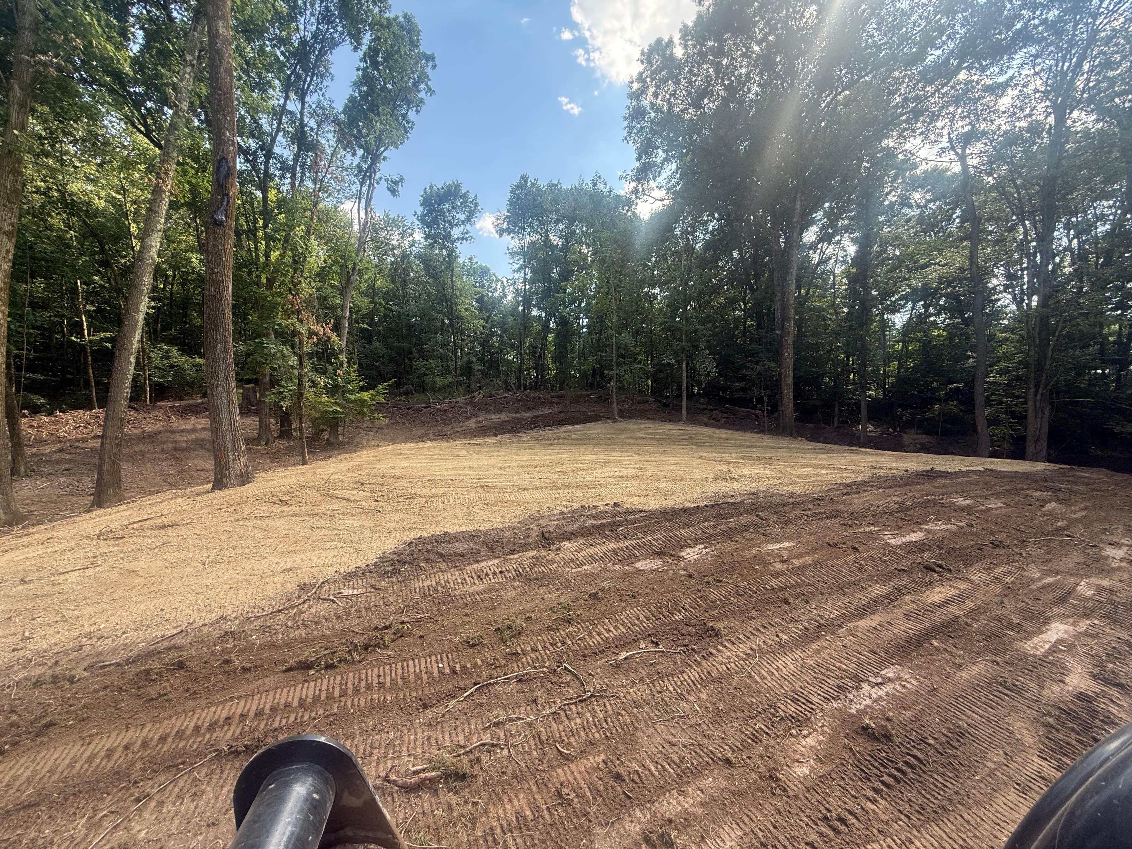 Project Rough Wooded Ground Cleared Into a Large, Level Usable Space image