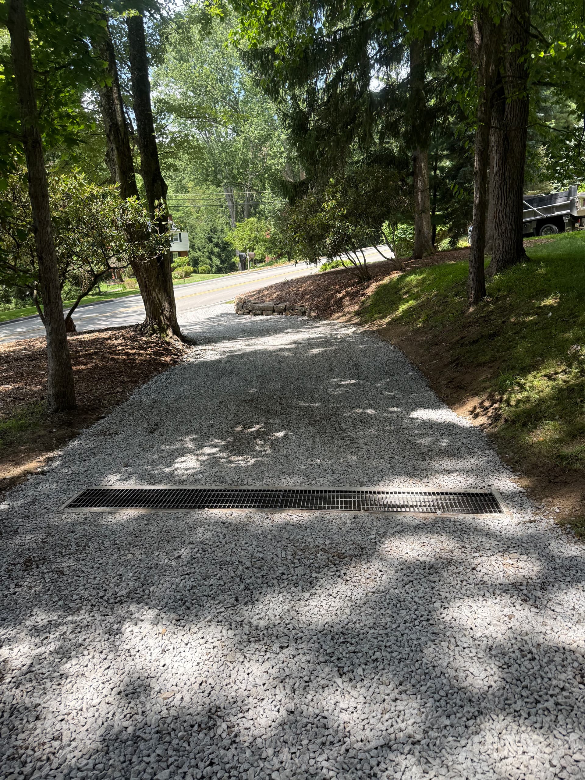 Gallery photos for Driveway Drainage Fix with New Catch Basins and Stone Wall Rebuild: Image #3