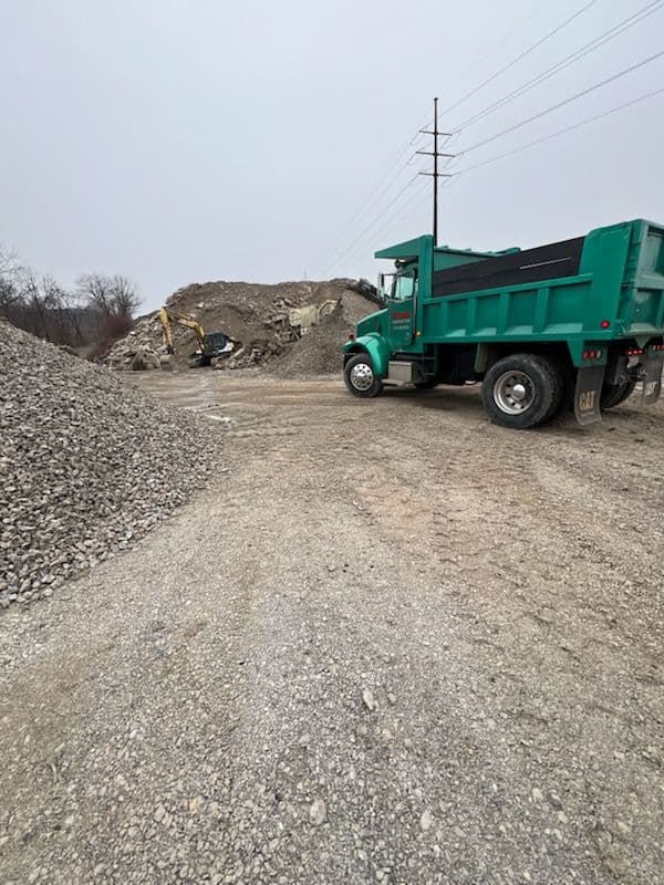 Stone Hauling and Foundation Backfilling image